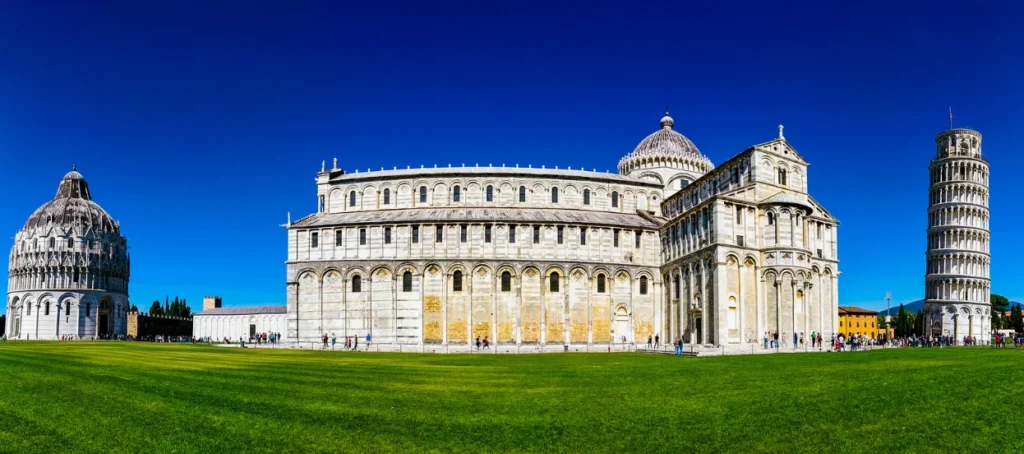 Panoramic view of Piazza dei Miracoli featuring the Leaning Tower, Cathedral, and Baptistery in Pisa, Italy